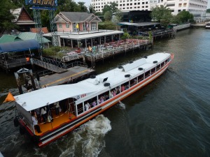 The public river boats that ply the Chao Phraya River.  Extremely effective, efficient and a little quaint transport in Bangkok.